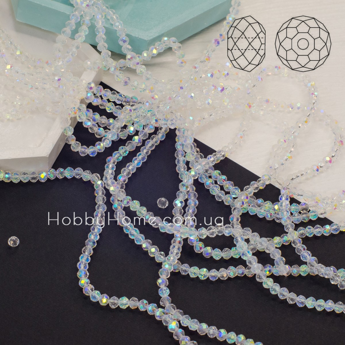 Ронделі прозорі 3×4 мм з AB — скляні грановані намистини Ронделі прозорі 3×4 мм з AB — скляні грановані намистини